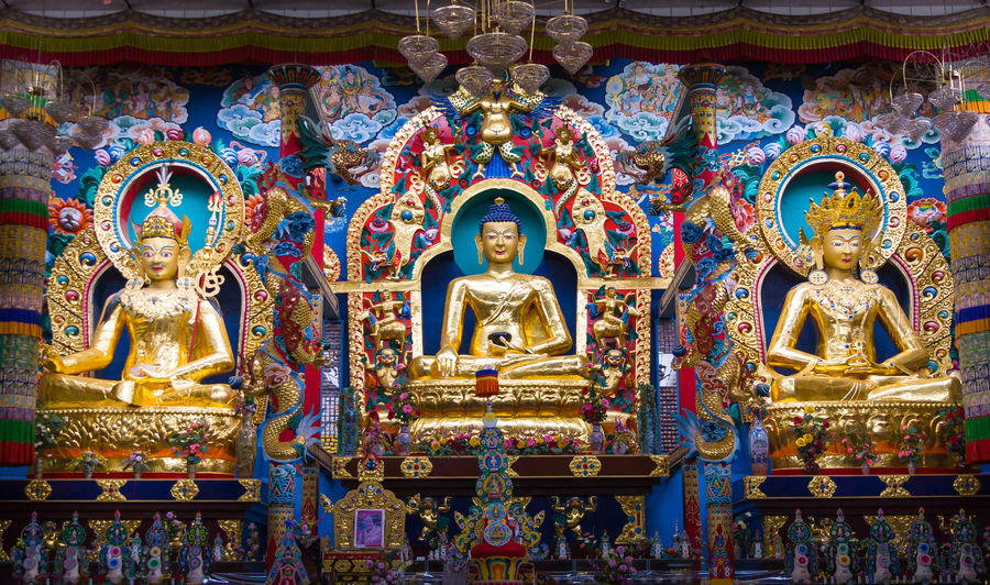 Padmasambhava, Buddha Shakyamuni, Buddha Maitreya statues at Tibetan Altar