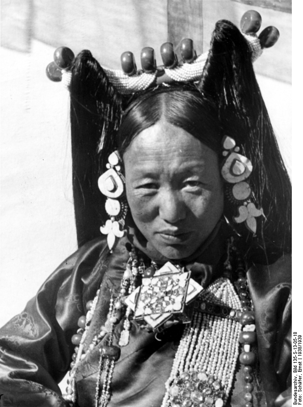 Plate 01: Lhasa. Mrs. Phünkhang wearing the patruk, headdress of the women of Central Tibet.