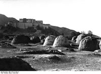 Shigatse. Chinese graves below the dzong.